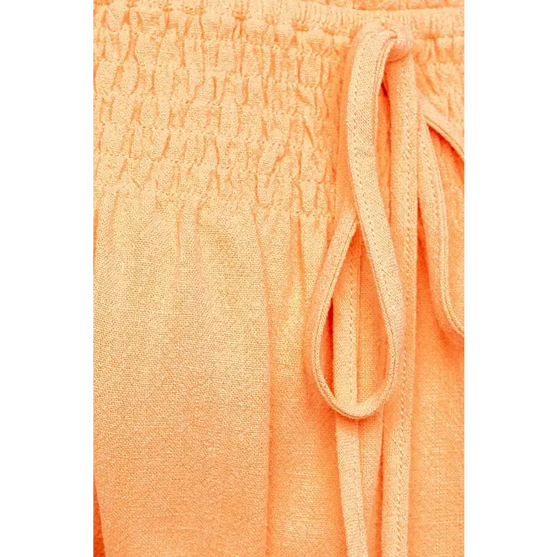 PUFF SLEEVE SMOCKING DETAIL FLARED TOP Tops